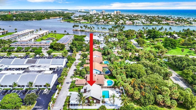 drone / aerial view with a water view