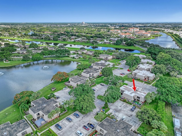 aerial view with a residential view and a water view