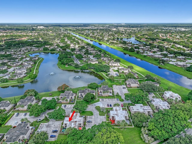 aerial view with a residential view and a water view