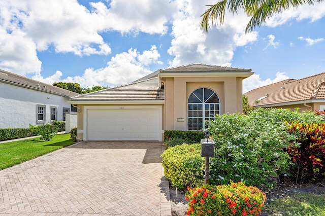 view of front of home featuring a garage