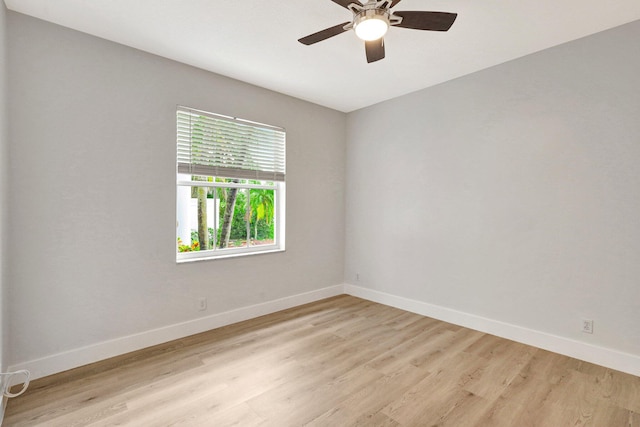 unfurnished room with ceiling fan and light hardwood / wood-style floors