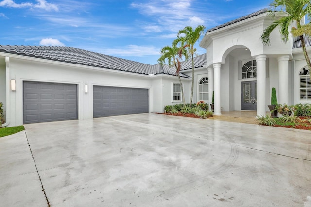 view of front of property featuring a garage