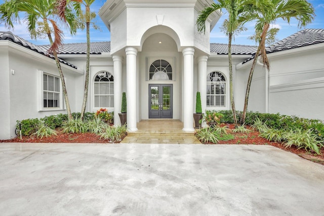 doorway to property with french doors