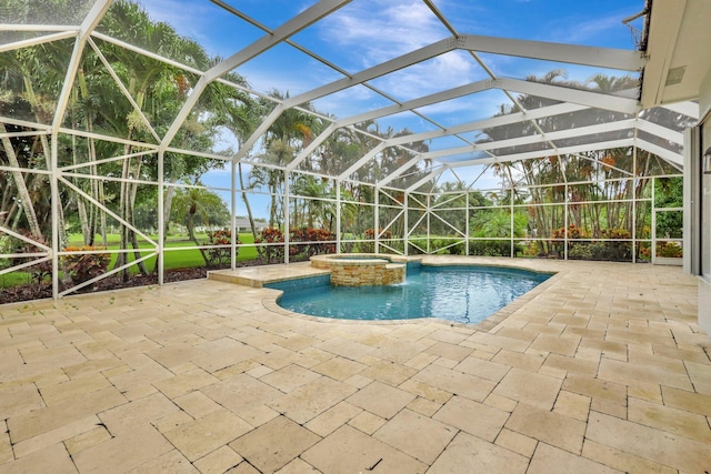 view of pool featuring an in ground hot tub, a patio, and a lanai