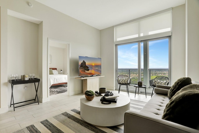 2000 Metropica Way Unit 2607, Sunrise, FL 33323 - living area with a high ceiling