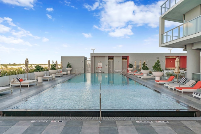 view of pool with an outdoor living space