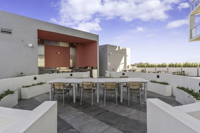 2000 Metropica Way Unit 2607, Sunrise, FL 33323 - view of patio / terrace featuring visible vents, outdoor wet bar, and area for grilling