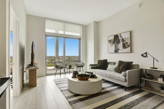 tiled living room with expansive windows