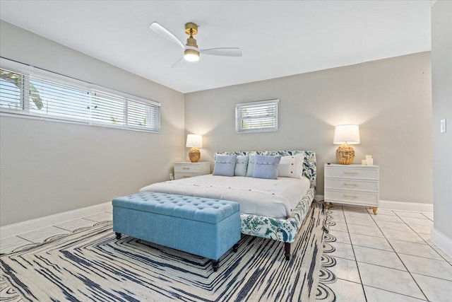 bedroom featuring ceiling fan and light tile patterned floors