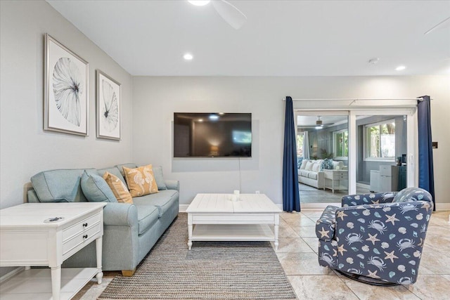 living room featuring ceiling fan