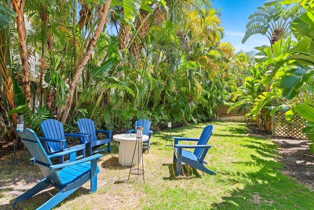 view of yard featuring a fire pit