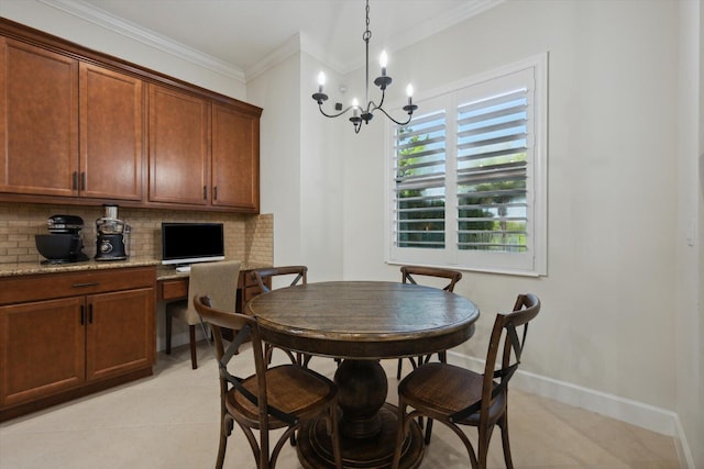 dining room featuring built in desk, an inviting chandelier, crown molding, and light tile patterned flooring