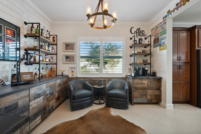 sitting room with bar area, light tile patterned floors, an inviting chandelier, and ornamental molding