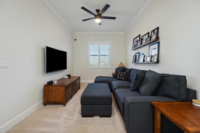 living room featuring light colored carpet, ceiling fan, and crown molding