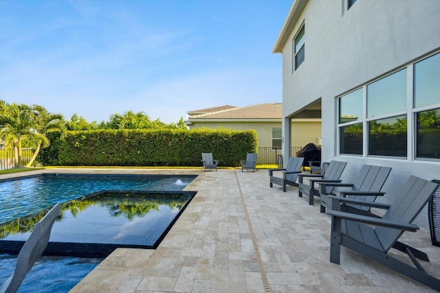 view of pool featuring a patio