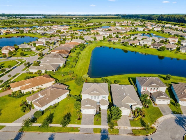 drone / aerial view with a water view