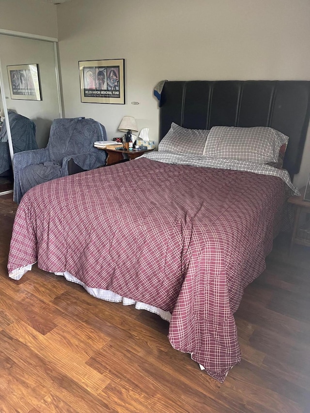 bedroom with wood-type flooring