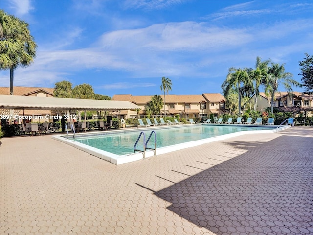 view of pool featuring a patio area