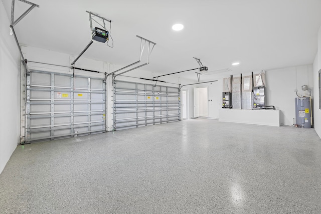 garage with a garage door opener, heating unit, water heater, and electric panel