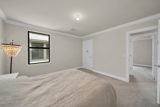 carpeted bedroom with crown molding and a chandelier