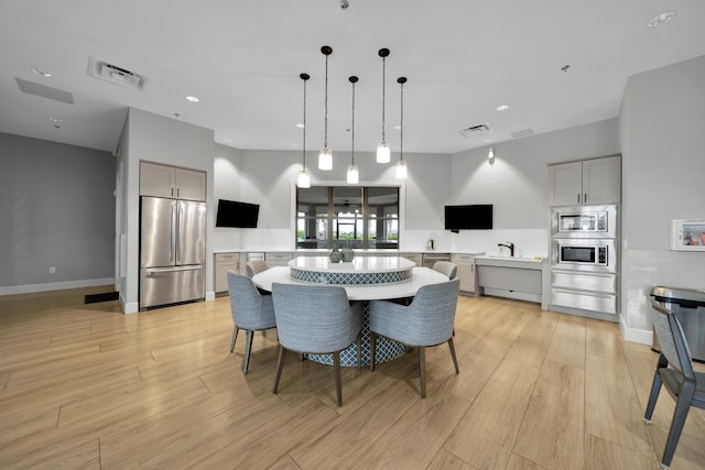 dining area featuring light hardwood / wood-style floors