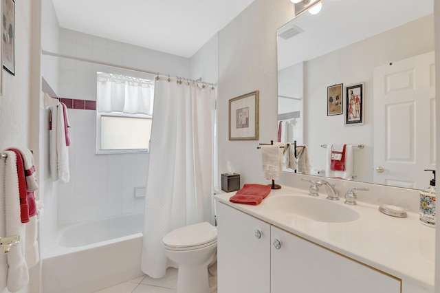 full bathroom featuring shower / bathtub combination with curtain, toilet, vanity, and tile patterned floors