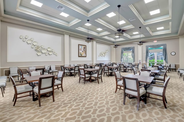 carpeted dining room featuring ceiling fan, beam ceiling, coffered ceiling, and ornamental molding