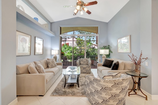 living room with ceiling fan, lofted ceiling, and a healthy amount of sunlight