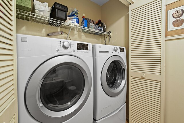 laundry room with washer and dryer