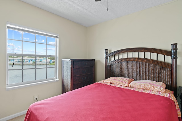 bedroom with a textured ceiling