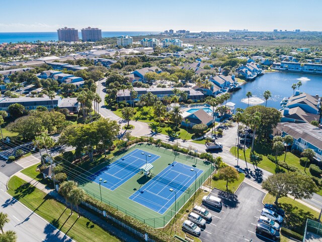 birds eye view of property featuring a water view