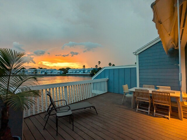 deck at dusk with a water view