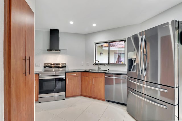 kitchen featuring wall chimney exhaust hood, stainless steel appliances, sink, and light tile patterned floors