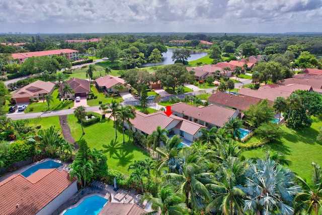 drone / aerial view featuring a water view