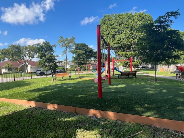 view of play area featuring a lawn