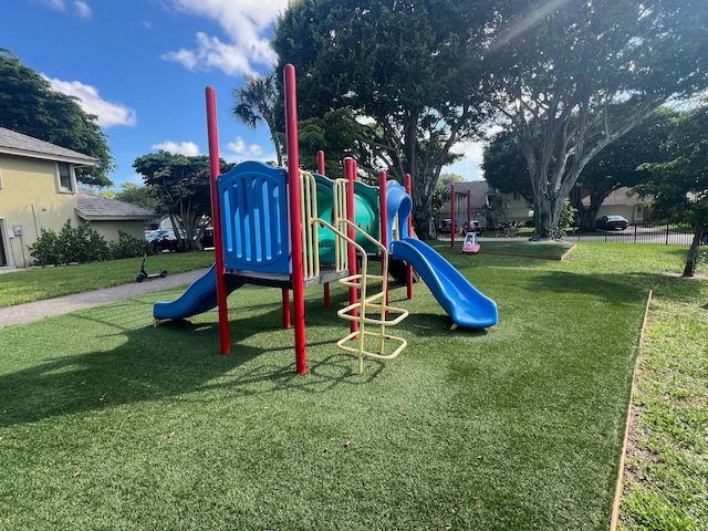 view of jungle gym with a yard