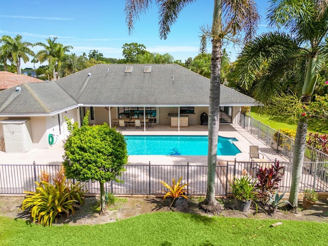 view of pool with a fenced in pool, fence private yard, and a patio