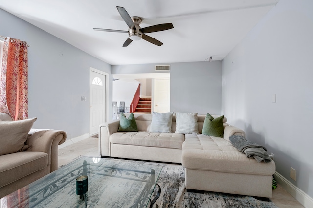 living room featuring ceiling fan