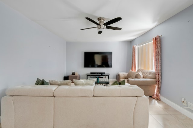 tiled living room featuring ceiling fan