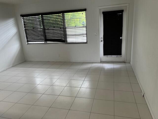 view of tiled empty room