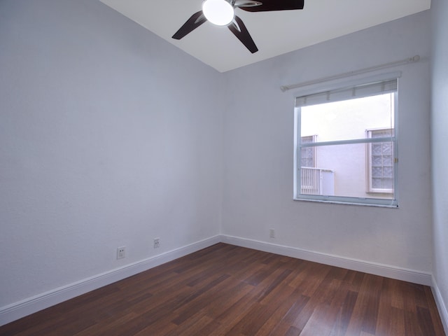 empty room with ceiling fan and hardwood / wood-style floors