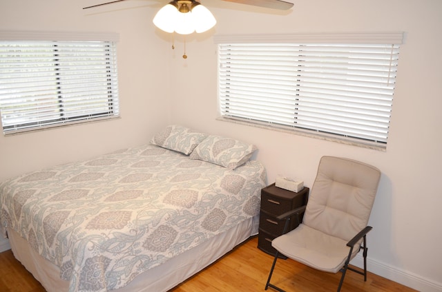 bedroom featuring ceiling fan and light hardwood / wood-style floors