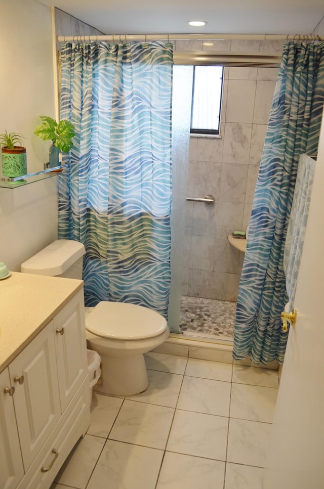 bathroom with tile patterned flooring, toilet, a shower with shower curtain, and vanity