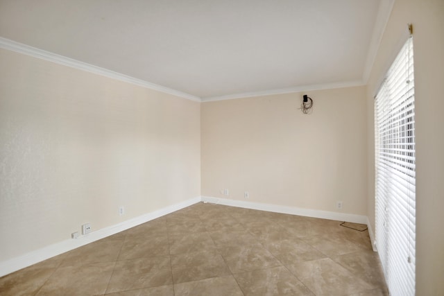 empty room featuring light tile patterned floors and ornamental molding