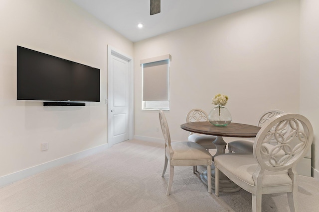 view of carpeted dining space