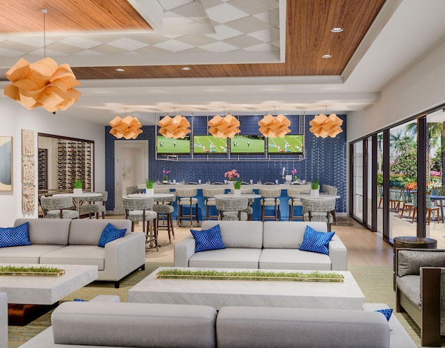 living room with wood ceiling and hardwood / wood-style flooring