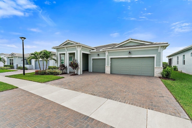 ranch-style house featuring a garage