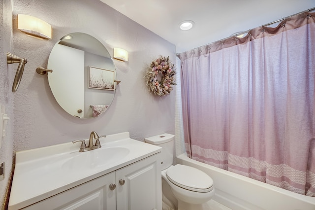 full bathroom featuring shower / tub combo, toilet, and vanity