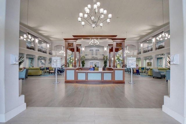 reception area featuring an inviting chandelier