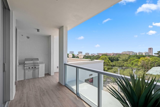 balcony featuring a view of city and area for grilling